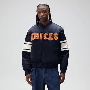 The Kith for the New York Knicks Patchwork Fleece Crewneck Sweatshirt is crafted